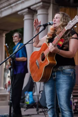 Alli Battaglia performing with her band Alli Battaglia & The Musical Brewing Co. during Friday Night Concerts.