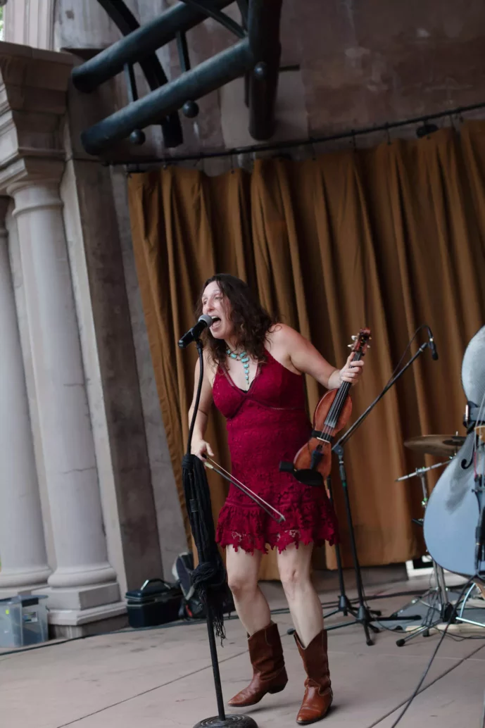 Rebecca Roundman performs on violin with her band Dirty Cello for Friday Night Concert, 2021