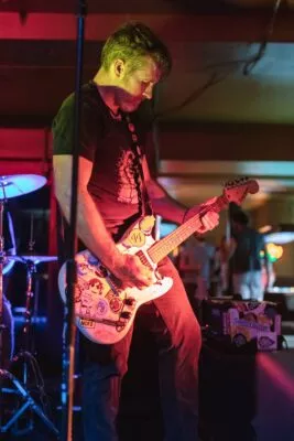 Adam Yates on lead guitar as, Furlough Fridays rocks the Downlo in Chico, CA in October 2021.