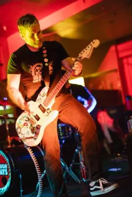 Adam Yates on lead guitar as, Furlough Fridays rocks the Downlo in Chico, CA in October 2021.
