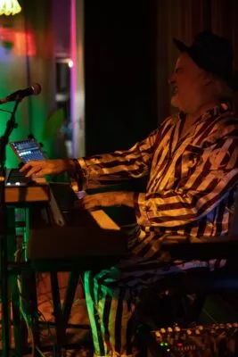 Glenn Tucker, performing on keyboards, with his band, Gravybrain at Om Foods in Chico, CA.