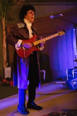 Jeff Pershing, in costume, performing on LaSalles patio during Halloween weekend, 2022.