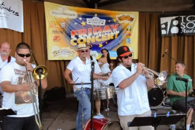 The horn section performing with Los Papi Chulos at Friday Night Concerts, 2012.